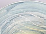 a close up of a bowl on a table