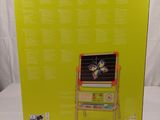 the box is open to show the contents of a children ' s toy set