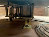 a small model of a train on a wooden table