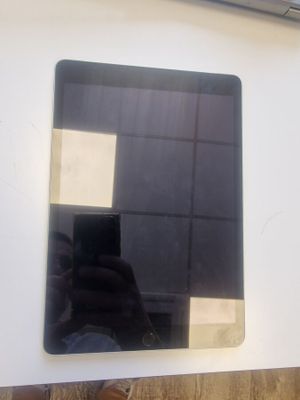 a person taking a picture of a reflection in a mirror