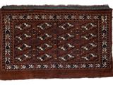 a brown rug with a design on it