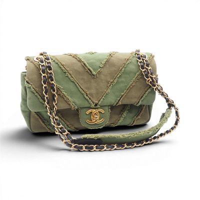 a picture of a chanel bag on a white background