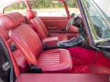 an image of a car with red leather seats in the back