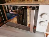 a microwave that is sitting on top of a counter