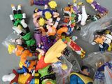 a lot of toy figurines that are on the table