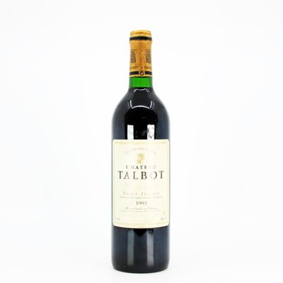a bottle of wine that is sitting on a table