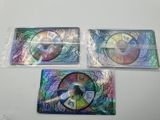 three cds sitting on top of each other on a table