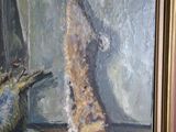 a painting of a cat and a bird on a table