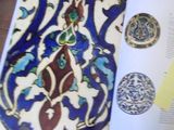 an open book with a picture of a decorative design on it