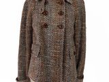 veste en tweed posée sur un mannequin