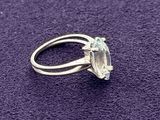 a close up of a ring on a purple surface