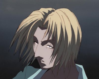 un personnage masculin d'anime aux cheveux blonds et portant une chemise bleue