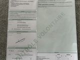 une photo d'une feuille de papier sur laquelle figure la photo d'une personne