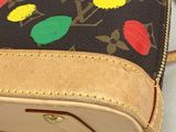 a purse that has a bunch of christmas lights on it