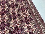 an image of a large oriental rug on a white floor