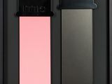 a close up of two different shades of lipstick in a black box