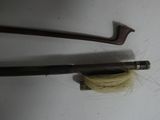two different types of canes on a white surface