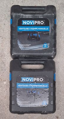 two black boxes that are sitting on the ground