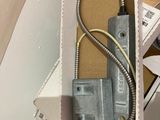 a box that has a couple of wires inside of it