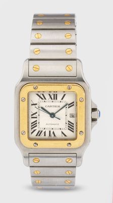 une photo d'une montre Cartier avec un cadran jaune et noir