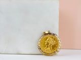 an image of a gold coin sitting on top of a marble block