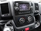 a dashboard of a car with a radio in it