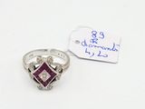 an image of a diamond and ruby ring with a price tag