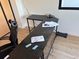 a desk with a chair and a computer monitor on it