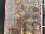 a picture of a binder with a bunch of coins in it