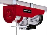 an image of a red electric hoist on a white background