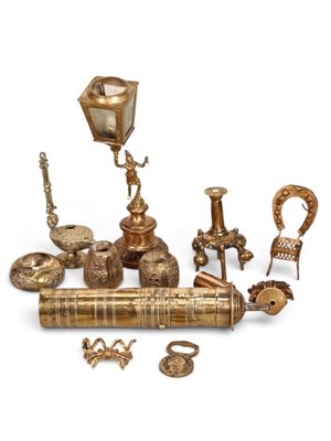 an image of a group of antique brass objects on a white background