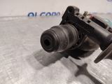 a close up of a water pump on a metal surface