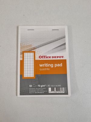an image of a piece of paper with writing pad on top of it