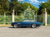 a car that is parked in front of a gate