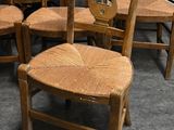 many chairs that are lined up together in a room