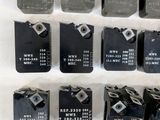 a lot of different types of electronic components on a table
