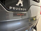 a close up of a car with a sticker on the front of it