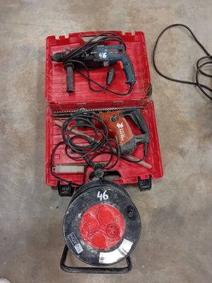 two tools in a red box on the floor
