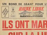 newspaper front page of a french newspaper with a picture of a bridge in the background