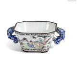 an image of a blue and white bowl with two handles