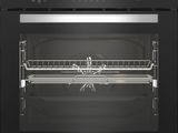 a black oven with the door open and the door open