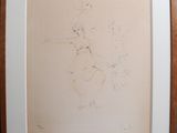 framed drawing of a woman sitting on a bench with a dog