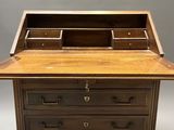 a wooden desk with drawers and drawers on top of it