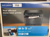 the box of the brother printer is sitting on the table