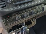 a picture of a car dashboard with a digital device in it