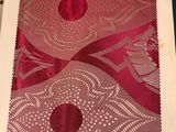 une photo d'un morceau de tissu orné d'un motif
