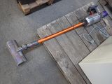 a corded vacuum that is on the floor