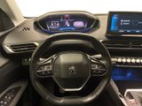 the interior of a car with a steering wheel, dashboard, and display screen