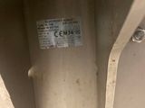 a close up of a metal object with a label on it