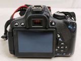 a digital camera that is sitting on a table